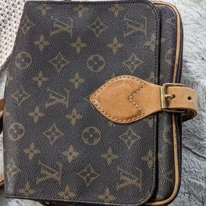 Authentic Louis Vuitton.